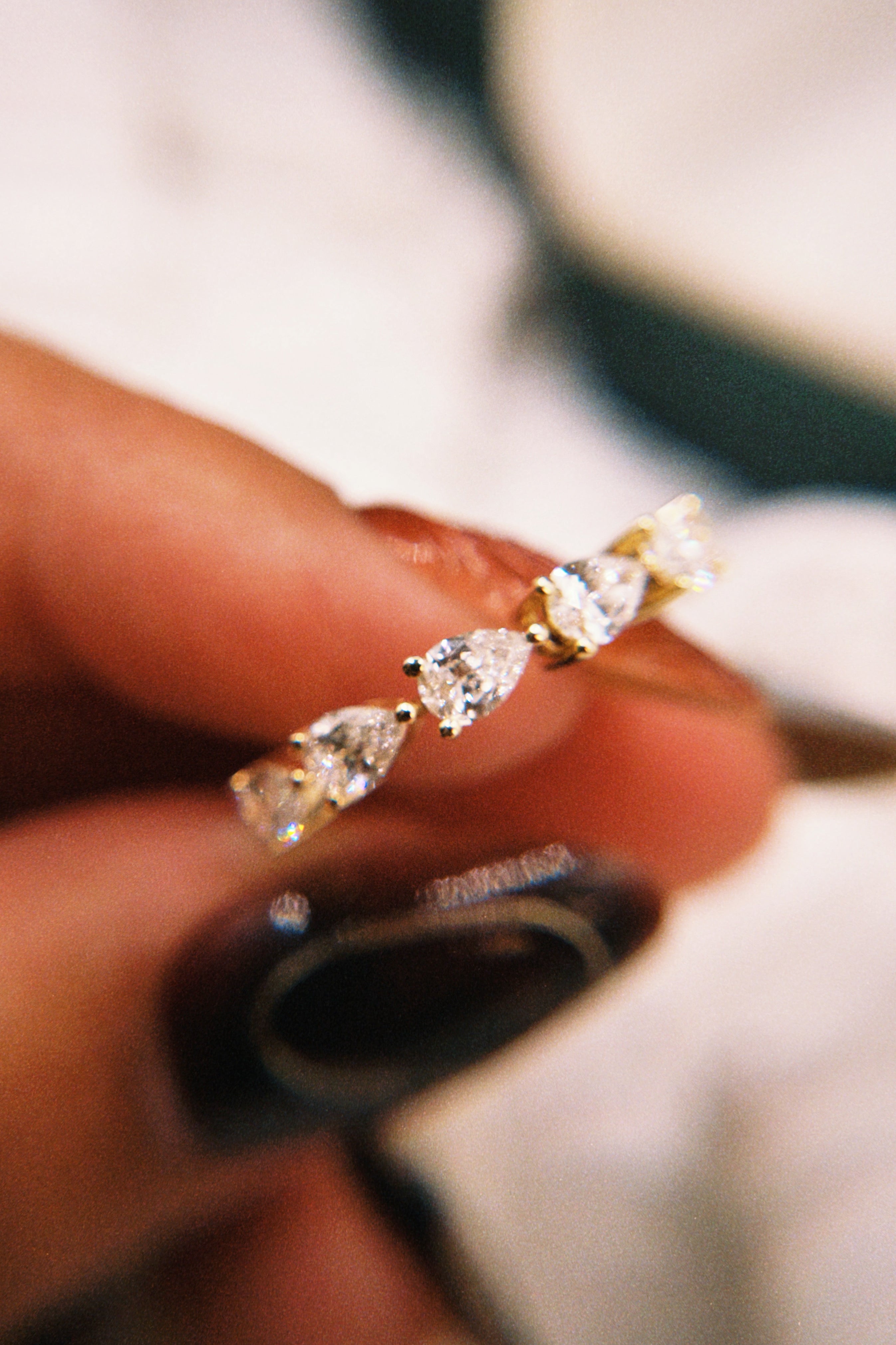 East-West Pear Shared Prong Eternity Band