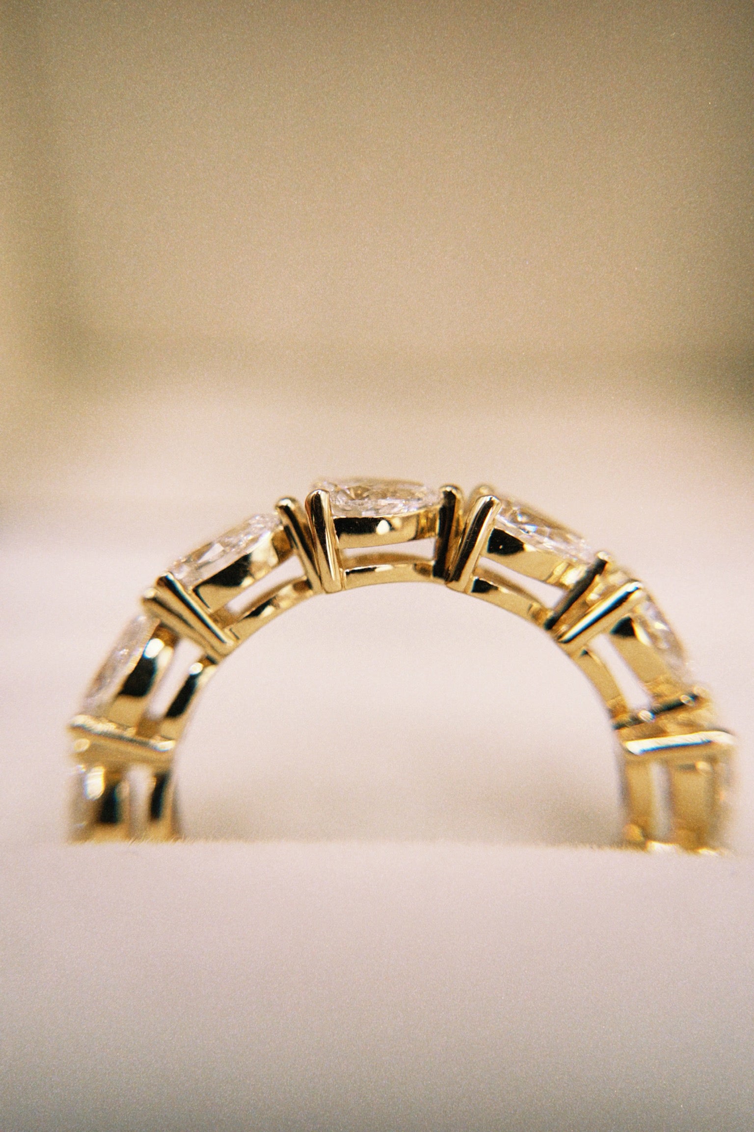 East-West Pear Shared Prong Eternity Band